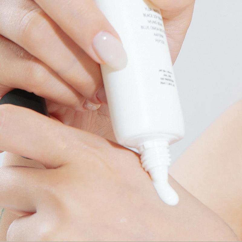 HEVEBLUE Black Yuja Bean Water Sun Essence SPF 50+ PA++++